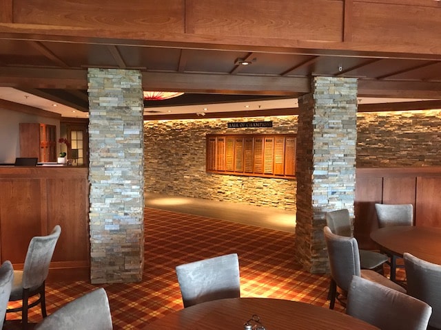 Norstone Ochre Rock Panels used on a wall of fame feature wall and columns in the dining room at a country club in Wisconsin